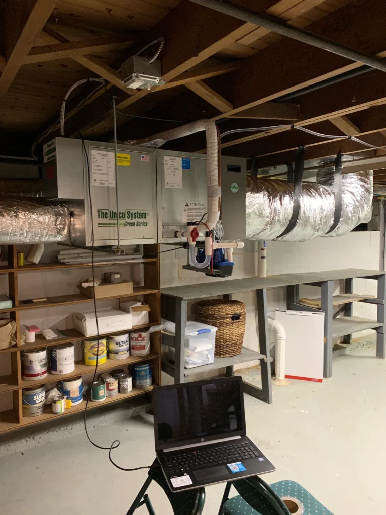 furnace in the basement with ductwork